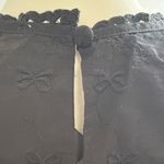 Le lis  Black Sleeveless Blouse with Side Ties Photo 4