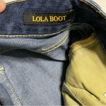 Lucky Brand Lola
Boot -12/31
Medium Blue Wash
- Low Rise - light
Distressing Photo 11