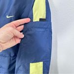 Nike 90s Streetwear Vintage Navy Blue and Yellow Logo Windbreaker Womens Size M Photo 4