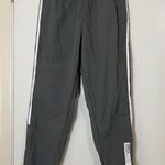 Adidas  gray tapered windbreaker jogger pants size US medium Photo 0