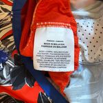 Nike Women’s  Dri-fit Orange blue and white floral print lined athletic shorts M Photo 3