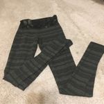 Lululemon  butterfly and striped Olive green and black leggings size 4 Photo 14