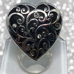 Silver filigree style heart shaped fashion… Silver Photo 0