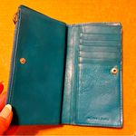 Michael Kors  leather wallet, teal blue, studded 7”x4” Photo 9