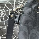 Coach Black  with Purple interior. Model # H1171-18708 Photo 1