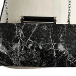 Sondra Roberts Sondra Robert’s Crossbody/Clutch Marbleized  design Handbag. Photo 0