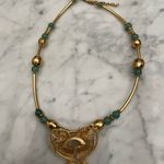 Woman’s golden antique necklace Photo 1