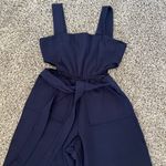Velvet Torch navy jumpsuit with cutout  size small Photo 1