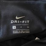 Nike -JUST DO IT-BLACK ACTIVE LEGGINGS-SIZE SMALL One legend pants with waistband pocket Measurements: Waist: side to side 13-16 inches Inseam: 24 inches Photo 4