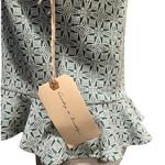 Sunday in Brooklyn  Peplum top with a geometric pattern  
Fits like a Small NWT Photo 5