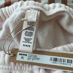 SKIMS  Cotton Fleece Classic Jogger in Barely Pink, Size Medium Photo 4