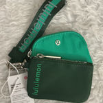 Lululemon Teal and Dark Green Dual Pouch Wristlet Photo 0