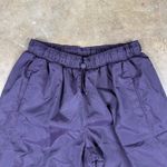 Athleta  Grace‎ Warm Up Pant Women’s XS Purple Nylon Wind Pants Cinch Hem Joggers Photo 1