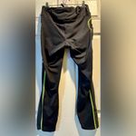 Under Armour Women’s  leggings - size XL - black w/neon green stitching - pockets Photo 11