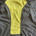 Nike Dri-Fit short sleeve tennis top. Black and yellow. Size small. Photo 3