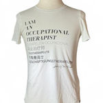 FIGS  White I AM AN OCCUPATIONAL THERAPIST Multilingual Graphic Tee Shirt Size S Photo 0