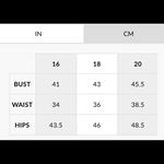 Boohoo Ivory short sleeve elongated back revealing top Photo 3