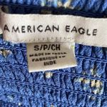 American Eagle OMG How cute is this jumpsuit, blue with small white flowers, smocked halter top, matching belt, has side hand pockets, excellent condition, size small Photo 9