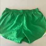 Nike  Women’s Size Large Green and Yellow Lightweight Performance Shorts Photo 4