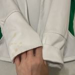 Danskin‎ Now large 12/14 has a reflective logo. Zips, hood, pockets. Stains Green Photo 4