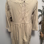 Free People  Textured Gauze Babydoll Tunic Top Beige XS Smocked Button Back Photo 0