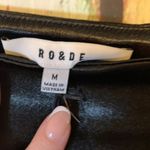 Ro & De NWT  Black Silky Lined Asymmetrical Hem Skirt Size M Photo 1