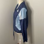 Adidas  wind breaker running jacket. Size Medium. Drawstring. Snap closure. Photo 1
