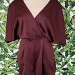 Urban Outfitters UO Satin V Neck Wrap Front Romper Photo 1