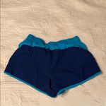Nike  Navy and Green Athletic Shorts for Running Photo 1