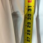 Nike  Women’s Dri-Fit White Golf Pants. size 12. zippered side pkts. EUC Photo 9