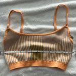 Fabletics orange and grey sports bra. Size medium Photo 12