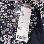 Urban Outfitters  Black motif romper dress in floral Photo 3