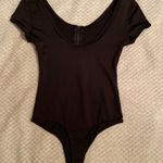 Charlotte Russe  Zipper Bodysuit Photo 1