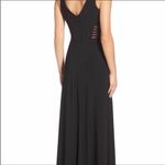 Women size small long black dress with small train bust and waist mesh detail Photo 5