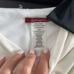 Women size S small One shoulder ivory top with black bow and crystals Photo 2