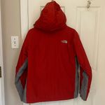 The North Face Prima Loft Summit Series Winter Coat in Red & Grey Photo 11