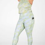 Fabletics 2Pc Grey Pin Dot Camo Tank And Leggings Reg $120 Ressler Crop Tank Color: Grey Pin Dot Camo Fabric 89% Polyester/11% Elastane Imported. Motion365® High-Waisted 7/8 Legging Color: Grey Pin Dot Camo Details Features Moisture-Wicking 4-Way Stretch Pockets Fabric Motion365® 75% Nylon/25% Elastane Imported. Photo 0