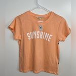 Orange pullover. New with tag. Brand Love Dazed. Size L. Size L Photo 2