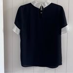 CeCe  Black Blouse with White Ruffle Sleeve Trim Photo 1