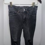 EXPRESS High Waisted Black Ripped 90s Bootcut Jeans Photo 6