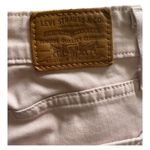 Levi's 721-PINK HIGH RISE-SIZE 25 Light pink high rise skinny jeans, excellent condition Measurements: Waist: side to side 13 inches Inseam: 29 inches Rise: 9 1/2 inches Photo 2