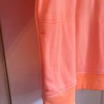 Under Armour  Womens Neon Orange Loose Fit Hoodie Sweatshirt Size M Fleece Interi Photo 4