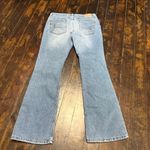 American Eagle  Distressed flared 8 petite jeans Photo 2