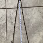 Black Crossbody Bag with Gold Accents. Bebe Black Quilted Crossbody Bag Photo 4