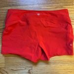 Athleta red Clearwater board swim shorts size 8 Photo 1