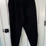 We’re Still Young Fanjoy black sweatpants yellow smiley face size small pockets Photo 3
