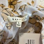 BaeVely size large baby doll top feeling vibrant white with gold floral design Photo 8