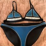Triangl Swimsuit Bikini Set Photo 0