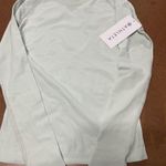 Athleta Women’s XXS long sleeve light green seamless momentum top Photo 0