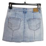 American Eagle  button through high rise light wash mini denim skirt size 00 Photo 1